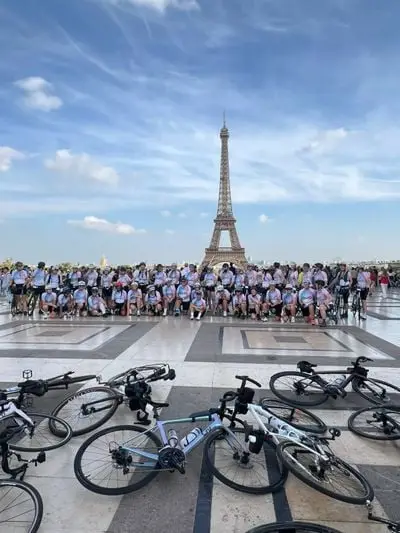 Post by Women in Property on LinkedIn: 🚴 ♀️ Two weeks ago, 51 intrepid women from across the built environment industry pulled on their cycling jerseys (a different team colour every day), donned their helmets and took to the road on a 180-mile adventure taking them from London to Paris, part of Women in Property's Sweatworking initiative. Some hadn't been on a bike in 20 years, and some were experienced athletes, but for all it was a shared experience of camaraderie, friendship, team spirit and more than a little resilience – the WiP ethos on wheels! Speaking on the Start line, Maddie Difazio-Wright, the driving force behind the ride and creator of WiP Sweatworking, said "The difference between an ordeal and an adventure is attitude. Each person here has their own reason for doing this event and I urge you to be aware of that. Someone standing next to you has an internal driver that you won't see. Take the time to find that out, because the people we meet are often carrying gifts we cannot see." The trip wasn't without its challenges – a cancelled ferry meant cycling through France at 5am, Paris roads were closed off and the ride rerouted because the Pope was in town, and there were the inevitable mechanicals but everyone responded with wonderfully good humour, and mutual support, all under the guidance of the amazing team from Discover Adventure The final destination was the iconic Eiffel Tower, the perfect place for a team photo opportunity, followed that evening with a celebration party and ‘Spiri...
